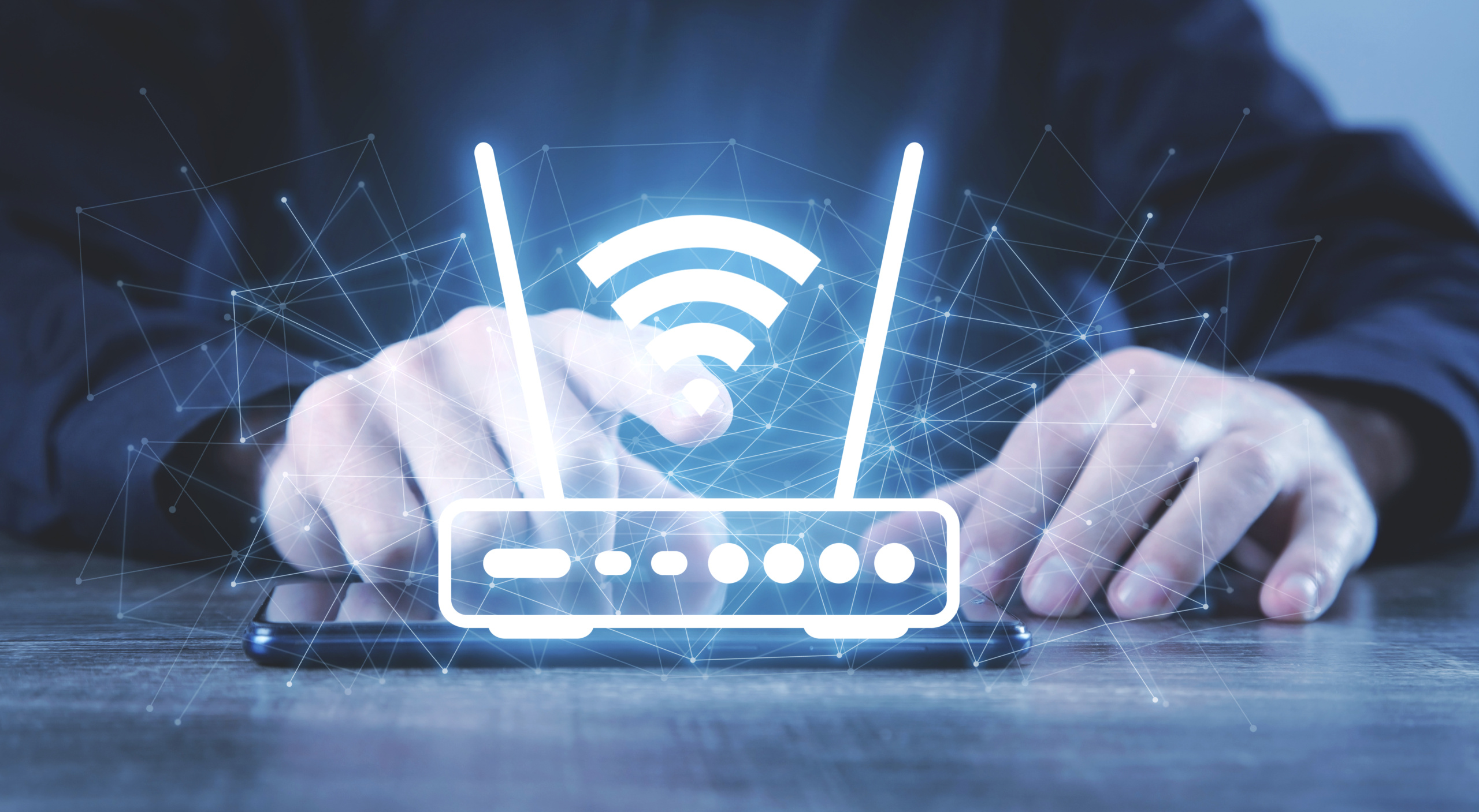 Man,Holding,A,Wifi,Router,And,Network.
