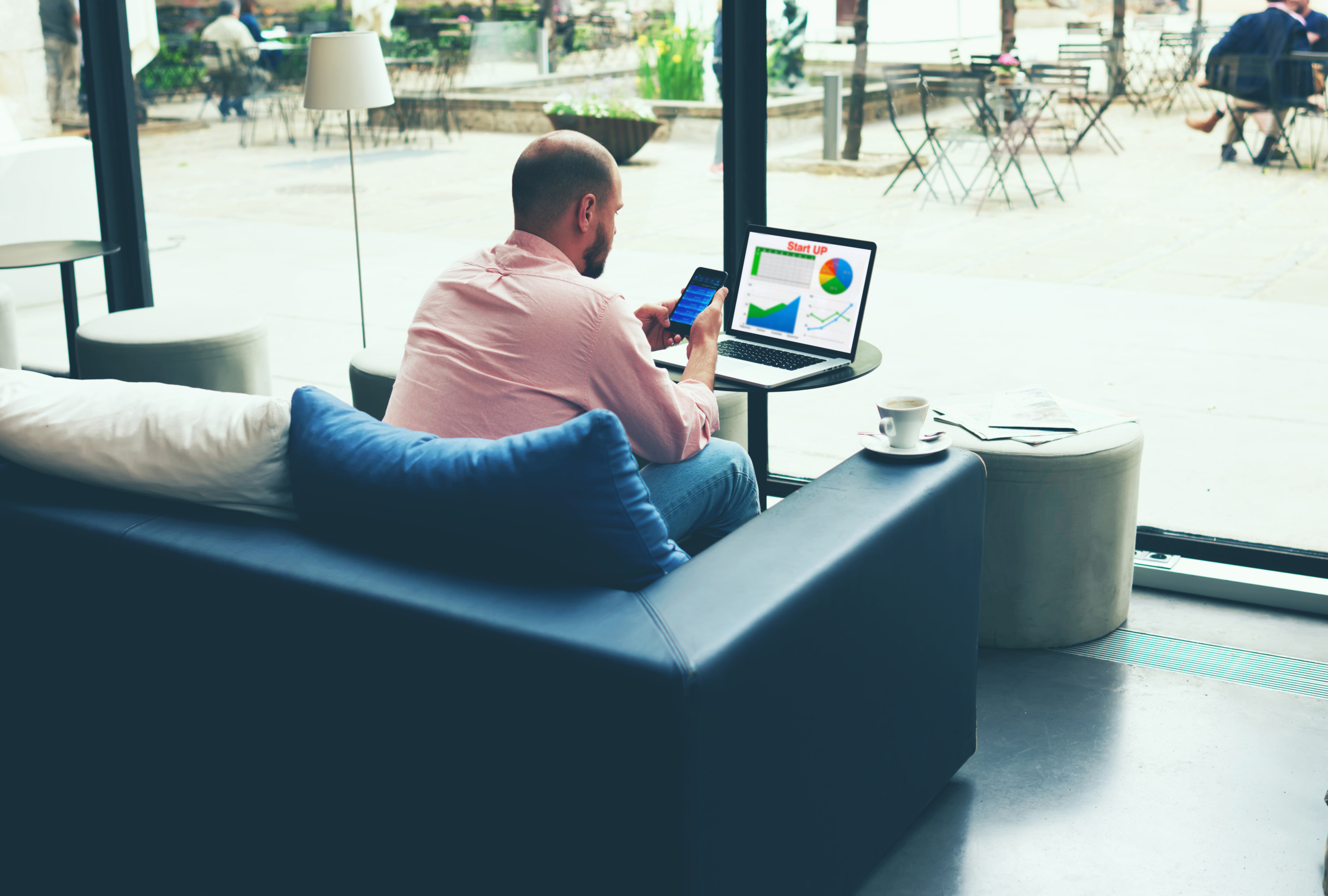Young,Business,Busy,Working,On,Laptop,Computer,And,Smart,Phone